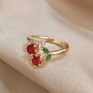 Gold Cherry Ring with Red Stones and Green Leaves